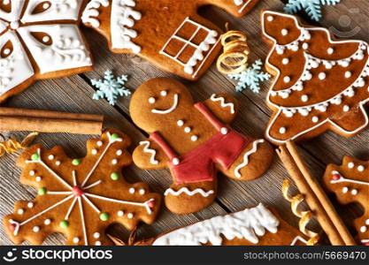 Christmas homemade gingerbread cookies on wooden table