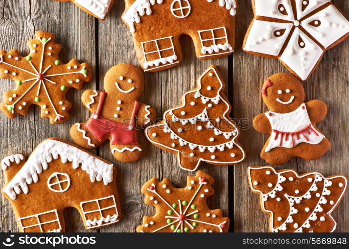 Christmas homemade gingerbread cookies on wooden table