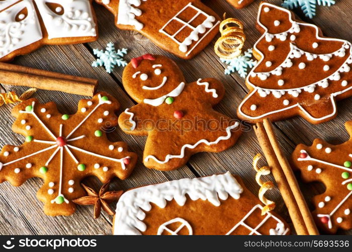 Christmas homemade gingerbread cookies on wooden table