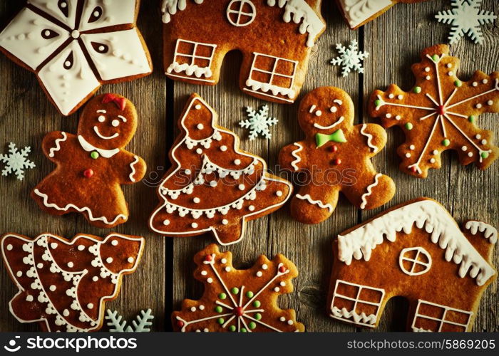 Christmas homemade gingerbread cookies on wooden table