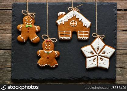 Christmas homemade gingerbread cookies over slate
