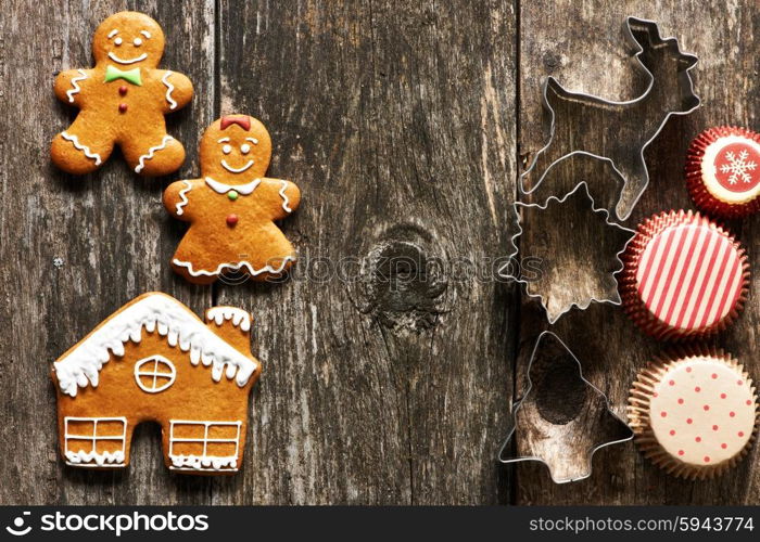 Christmas homemade gingerbread couple cookies on wooden table