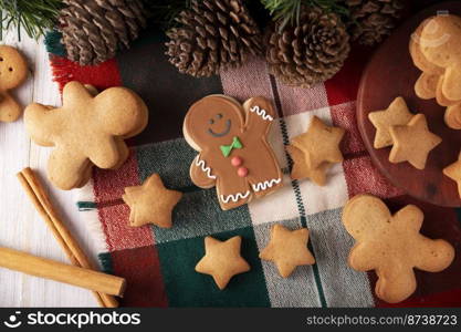 Christmas Homemade gingerbread man cookies, traditionally made at wintertime and the holidays. Top view.