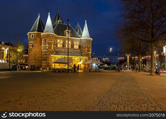 Christmas in Amsterdam at the Nieuwmarkt with the Waag building in Amsterdam at sunset