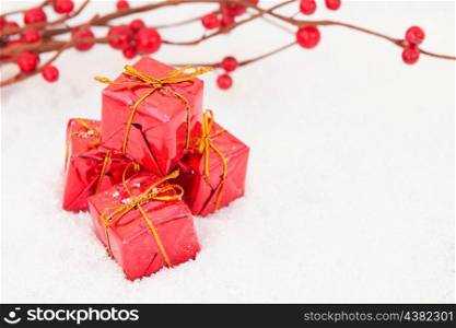 Christmas in red. Balls and gifts with snow for the Xmas tree decoration