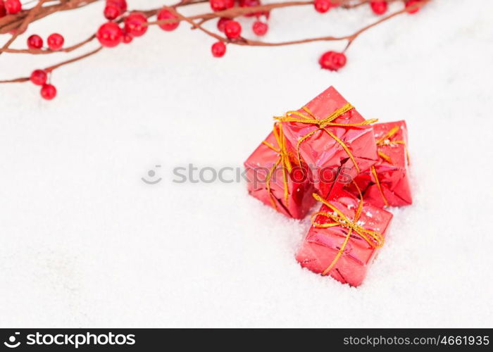 Christmas in red. Balls and gifts with snow for the Xmas tree decoration