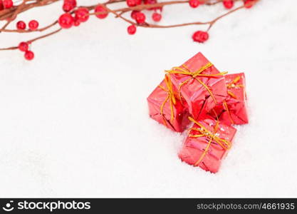 Christmas in red. Balls and gifts with snow for the Xmas tree decoration