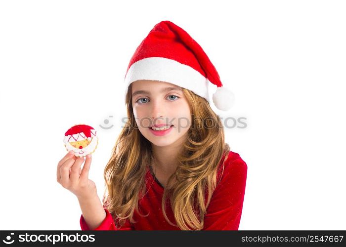 Christmas kid girl holding Xmas Santa cookie isolated on white background