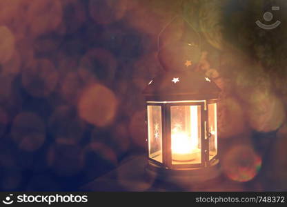 Christmas lantern with snowfall, Closeup.. Christmas lantern with snowfall