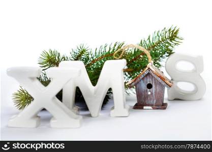 Christmas letters with decorations over white