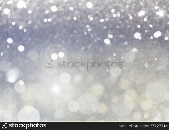 christmas lights bokeh defocused light silver gray background. christmas lights defocused background