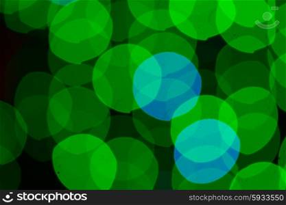 christmas lights defocused background. christmas green and blue lights bokeh defocused background