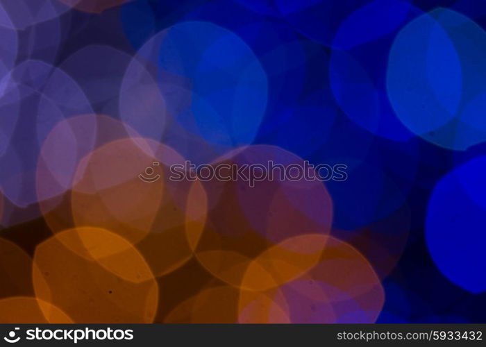 christmas lights defocused background. christmas orange and blue lights bokeh defocused background