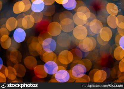 christmas lights defocused background. christmas yellow and blue lights bokeh defocused abstract background