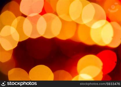 christmas lights defocused background. christmas yellow and red lights defocused background