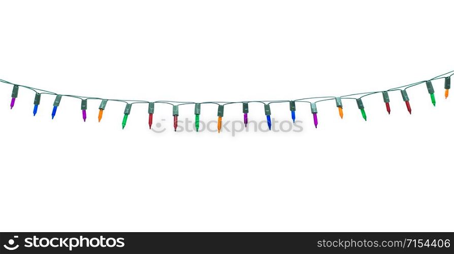 Christmas lights on dark wooden background. Merry Christmas and happy new year with copy space for a text.