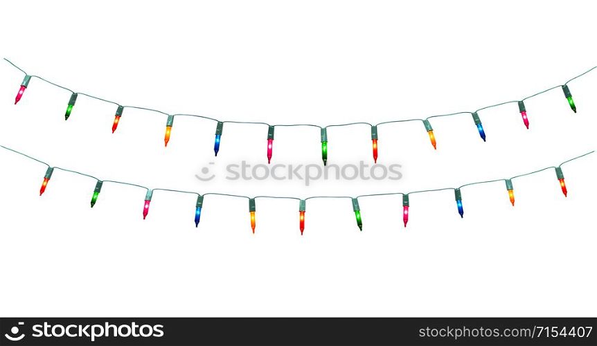 Christmas lights on dark wooden background. Merry Christmas and happy new year with copy space for a text.