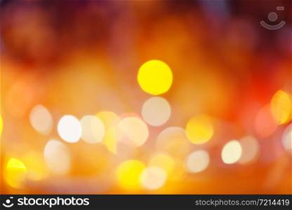 christmas lights orange yellow and red / lights bokeh abstract background multicolored christmas decorate new year concept