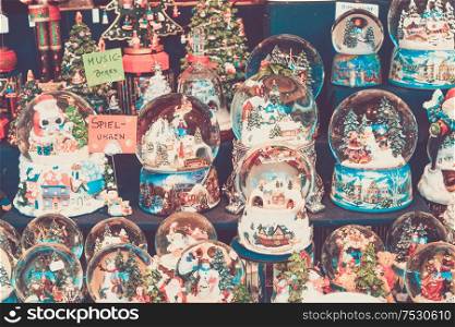 Christmas market kiosk details - traditional austrian festive snowballs, retro toned. Christmas market kiosk details