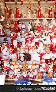 Christmas market kiosk details - traditional festive figurines decorations. Christmas market kiosk details