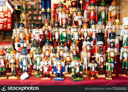 Christmas market kiosk details - traditional festive figurines decorations for sale. Christmas market kiosk details
