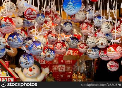 Christmas market kiosk - traditional hanging christmas tree decorations. Christmas market kiosk details