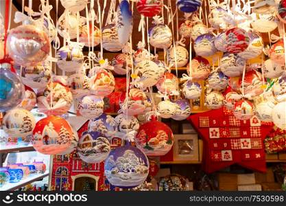 Christmas market kiosk - traditional hanging festive christmas tree decorations. Christmas market kiosk details