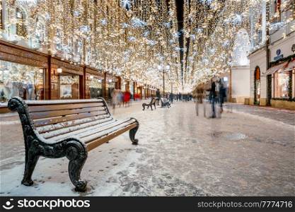 Christmas market stalls and Christmas street light decoration.