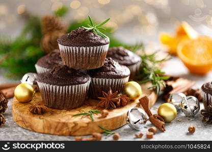 Christmas muffins. Chocolate Xmas or Noel festive bake with decorations and fir tree