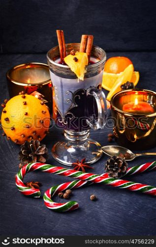 Christmas mulled wine. Christmas mulled wine with an orange slice in a stylish glass