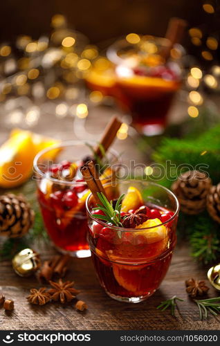 Christmas mulled wine. Traditional festive drink with decorations and fir tree