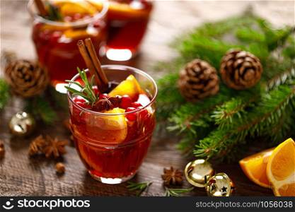 Christmas mulled wine. Traditional festive drink with decorations and fir tree