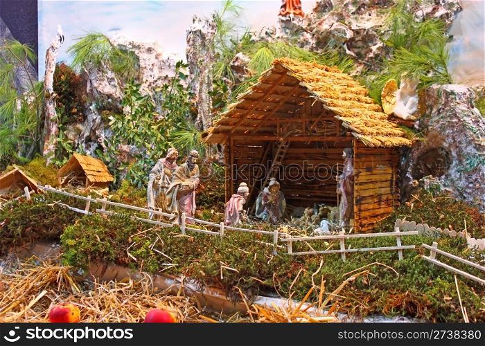 Christmas nativity scene of jesus birth in an old cottage
