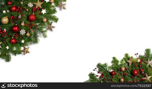 Christmas New year decoration frame isolated on white , fir tree branches , red and golden baubles , pine cones , stars , copy space for text. Christmas decoration frame