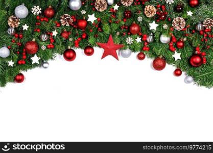 Christmas New year decoration frame isolated on white , fir tree branches , red baubles and pine cones , wooden decor , red berries , copy space for text. Christmas decoration frame