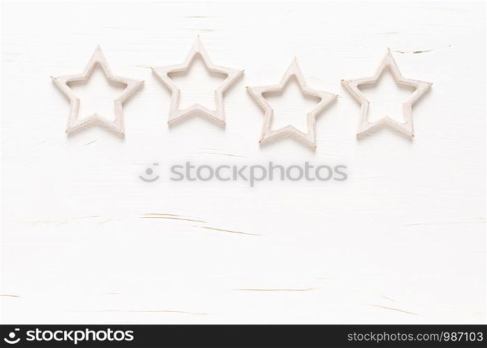 Christmas, New Year or Noel holiday festive winter greeting card with xmas decorations, stars on white background, x-mas flat lay composition, top view, copy space