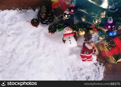 Christmas or New Year decoration background. gift pine cones and snow fir tree with copy space