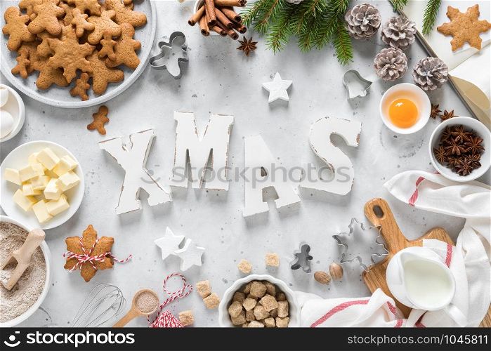 Christmas or Xmas baking culinary background. Ingredients for cooking on kitchen table. New Year or Noel holiday festive decorations. Greeting card