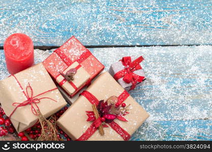 christmas ornament in snow on wood background. studio shot