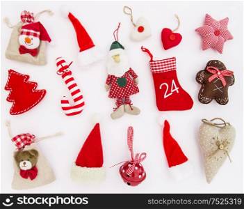 Christmas ornaments and decorations on white background. Winter Holidays. Red toys
