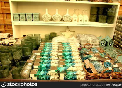 Christmas ornaments in teal and pastel blue colors in a christmas retail shop