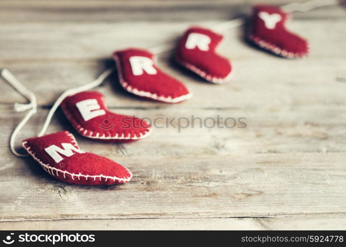 Christmas ornaments on rustic wooden background