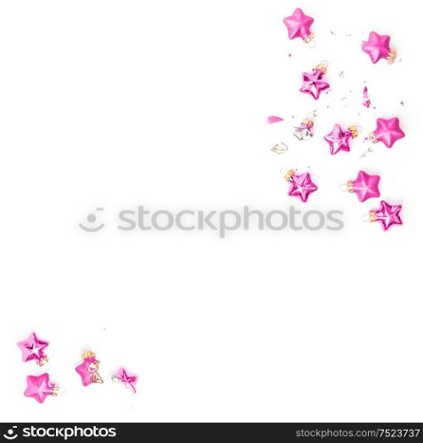 Christmas ornaments on white background. Broken pink baubles. Minimal flat lay