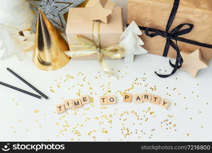 Christmas party time - confetti, gifts, ribbon, stars. Party time lettering. New year 2022. Christmas party time - confetti, gifts, ribbon, stars. Party time lettering. New year 2022.