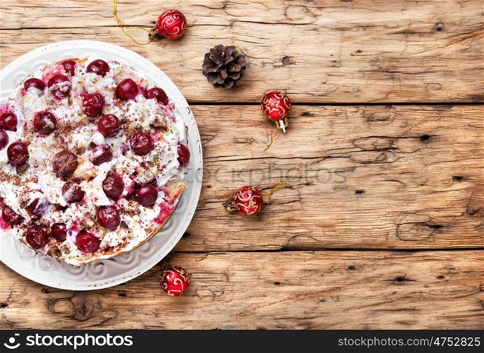christmas pie with cherry in a rustic style. Christmas cherry pie