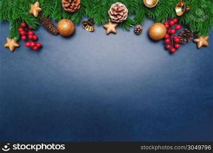 Christmas pine tree with xmas decoration on blue background