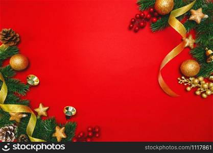 Christmas pine tree with xmas decoration on Red background