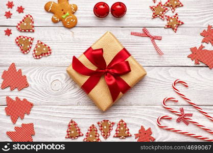 Christmas present and decoration on wooden background