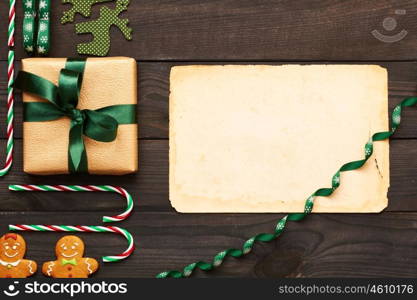 Christmas present and decoration on wooden background flat lay still life