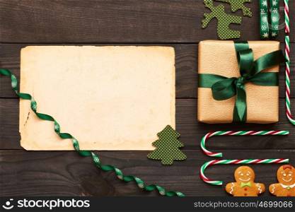 Christmas present and decoration on wooden background flat lay still life
